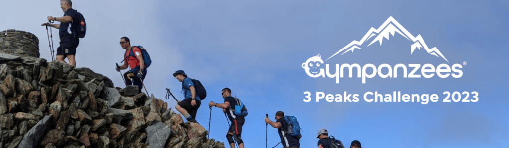Men are climbing up a mountain, next to them is a Gympanzees 3 Peaks Challenge 2023 logo