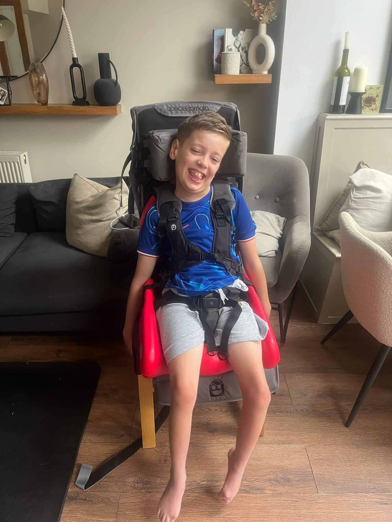 young child in an adapted seating