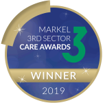Markel 3rd Sector Care Awards with a dark circle reading 'Markel 3rd Sector Care Awards 3' with a banner underneath reading 'Winner,' and then '2019' underneath this.